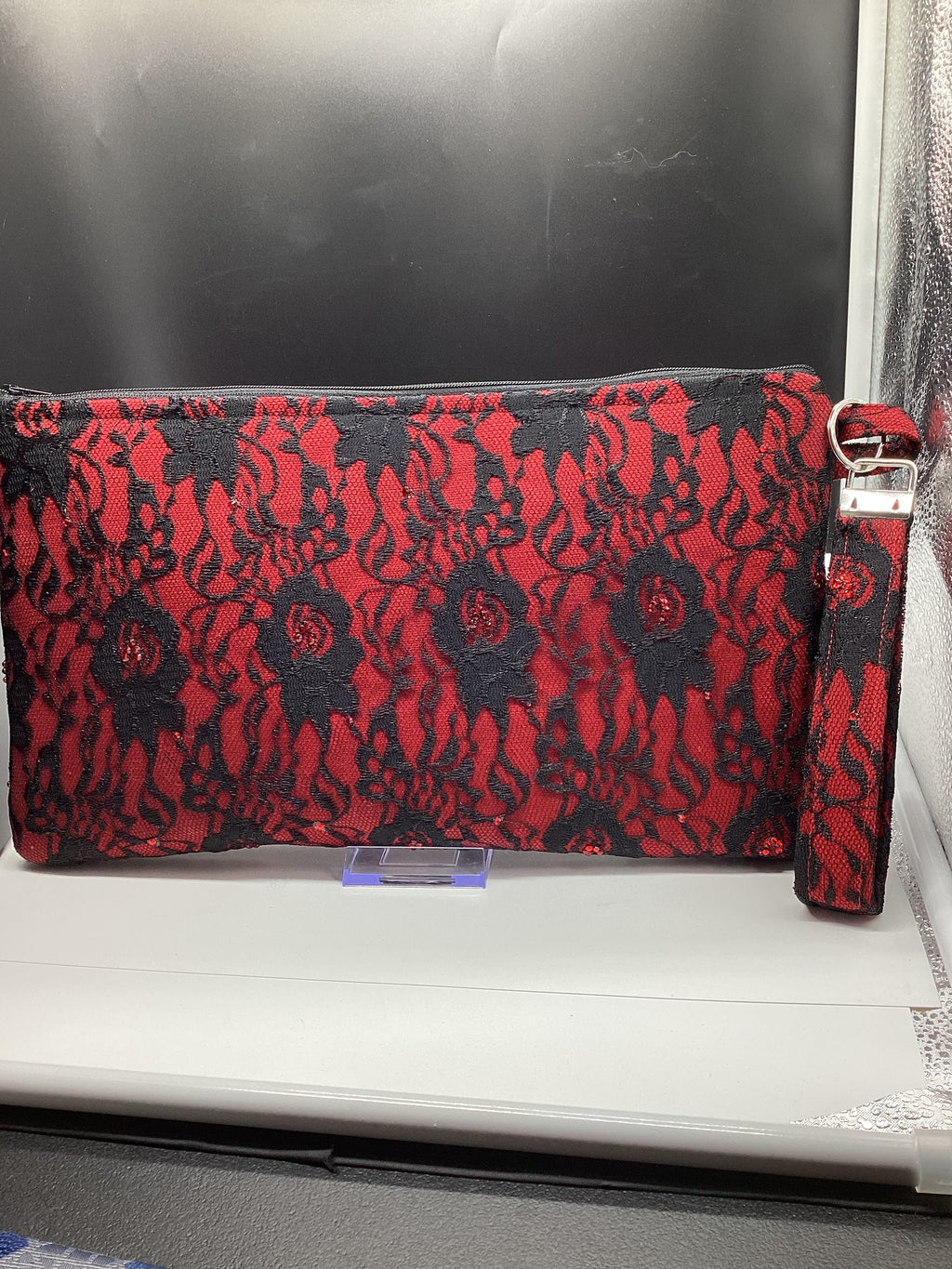 Midnight lace clutch bag