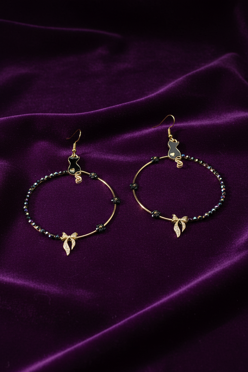 Better in black earrings
